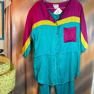Vintage 80’s color block pant suit.‎ Turquoise and pink. 42” chest 15” waist 135